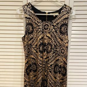 Women’s black and gold sequin dress. Large.